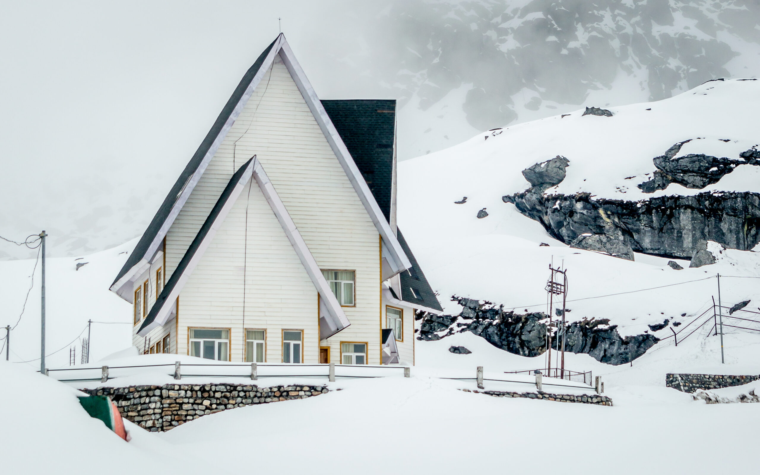 Sikkim, India - May 02, 2018: A beautiful snow covered house near Nathula pass, India China border, Sikkim, India