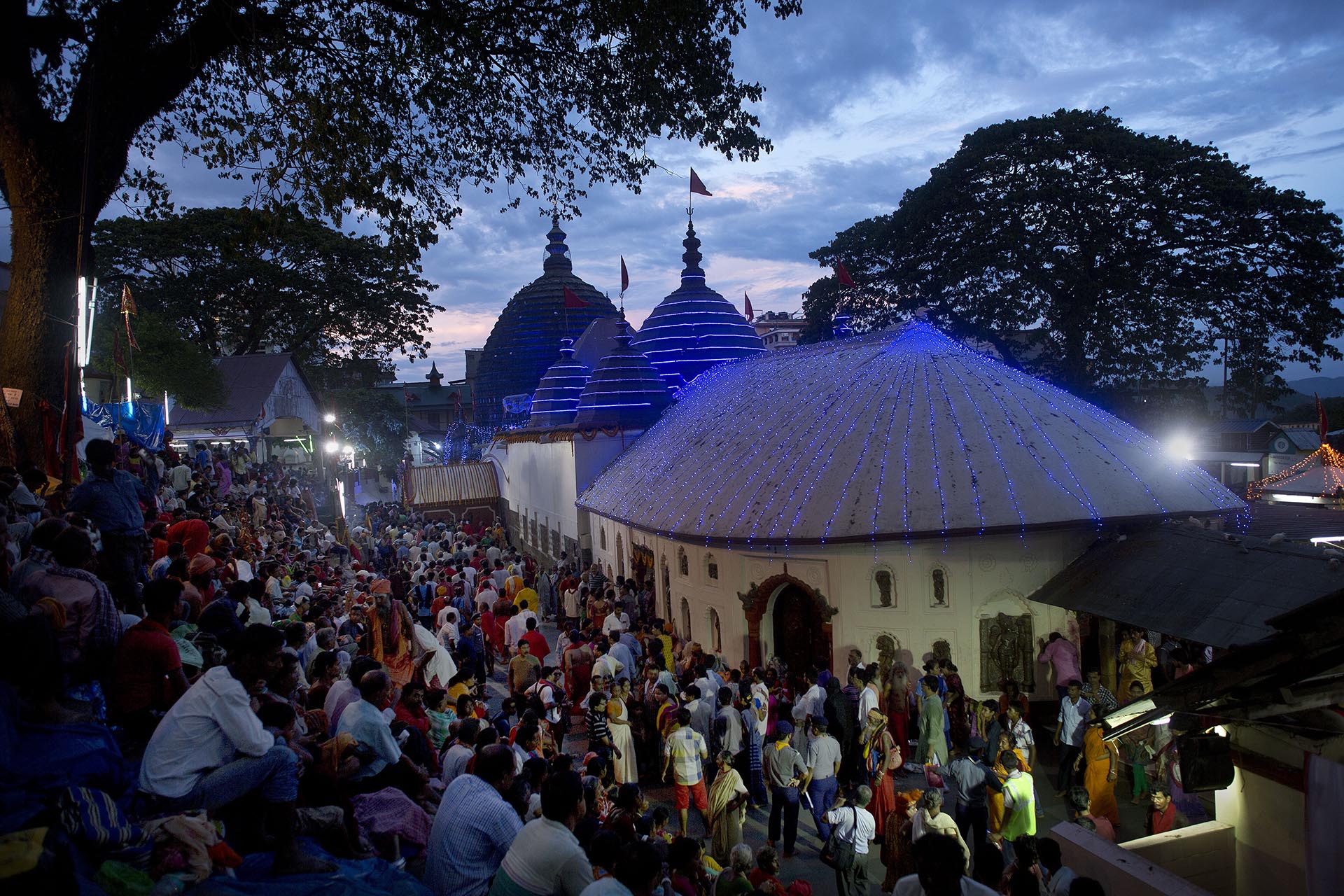 Indian devotees gather at the Kamakhya temple during the annual Ambubasi festival in Gauhati, India , Wednesday, June 24, 2015. Hundreds of Sadhus, or Hindu holy men, have arrived for the five-day festival to perform rituals at the temple during the annual Ambubasi festival that began Monday. (AP Photo/ Anupam Nath)