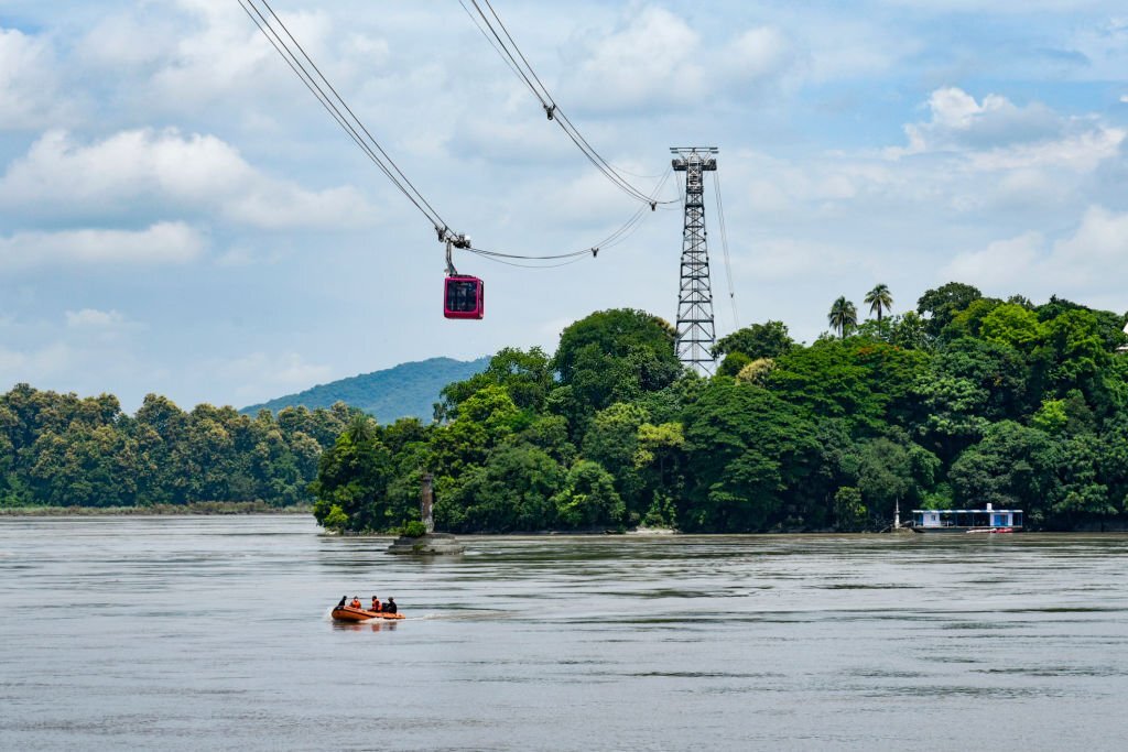 Guwahati, India. 24 August 2020. Passengers travelling in Indias longest river ropeway connecting Guwahati and North Guwahati over the River Brahmaputra.