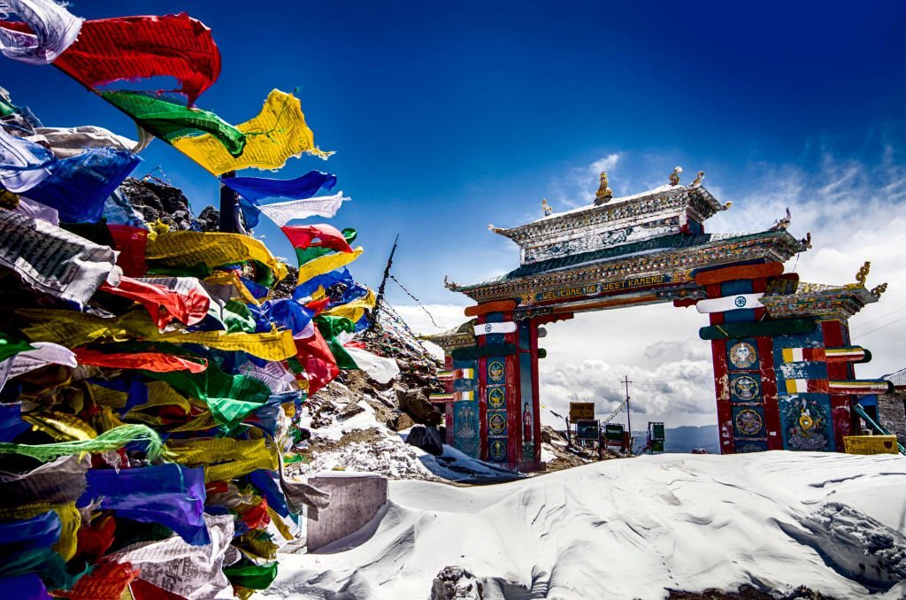 Tawang, Arunachal Pradesh, India. The Buddhist architecture, prayer flags and full of snow on a misty morning at Tawang, Arunachal Pradesh, North East India.