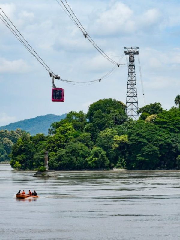 Guwahati, India. 24 August 2020. Passengers travelling in Indias longest river ropeway connecting Guwahati and North Guwahati over the River Brahmaputra.